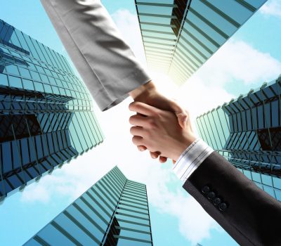 close-up-image-of-hand-shake-against-skyscrapers-2026-04-14-00-13-36-utc